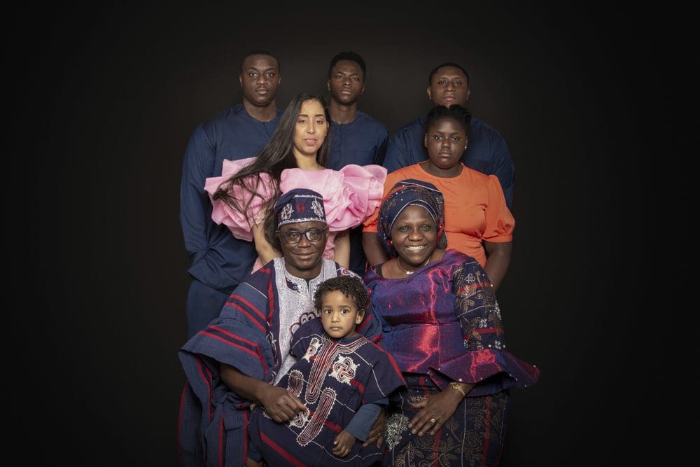 Multi-generation family photoshoot in Birmingham featuring traditional cultural clothing and heritage attire