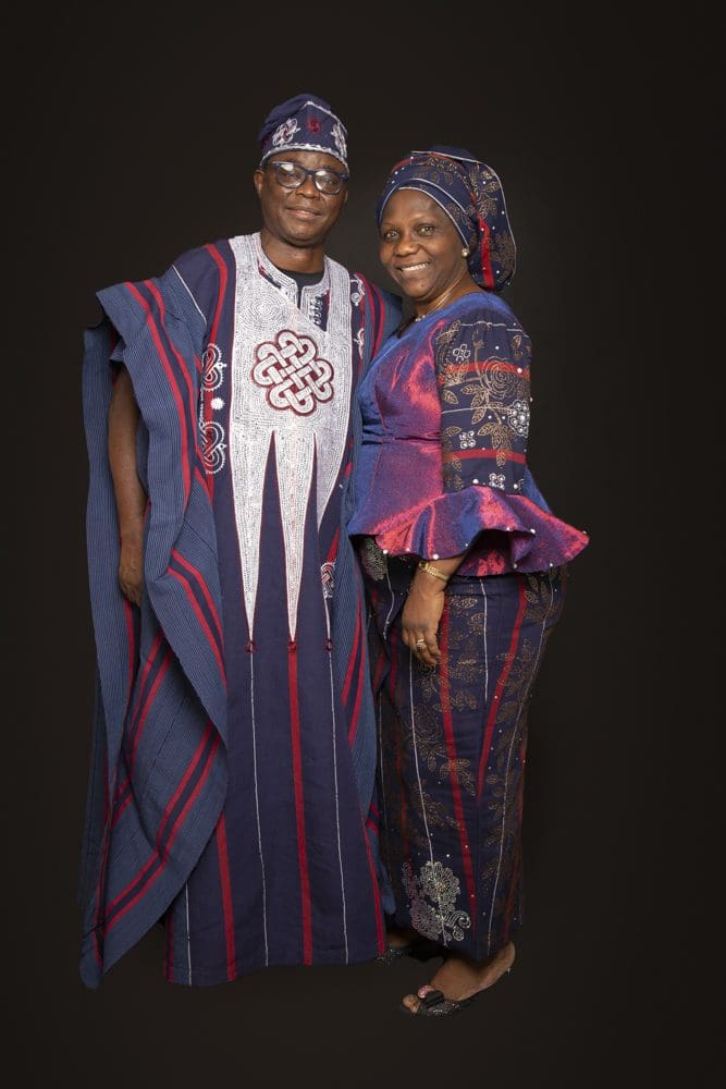 Full-length studio portrait of a couple in traditional cultural clothing during a Birmingham family photoshoot