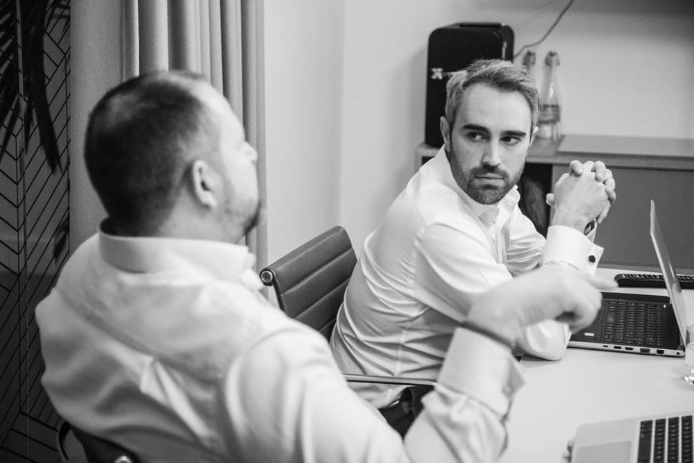 company photoshoot meeting b&w