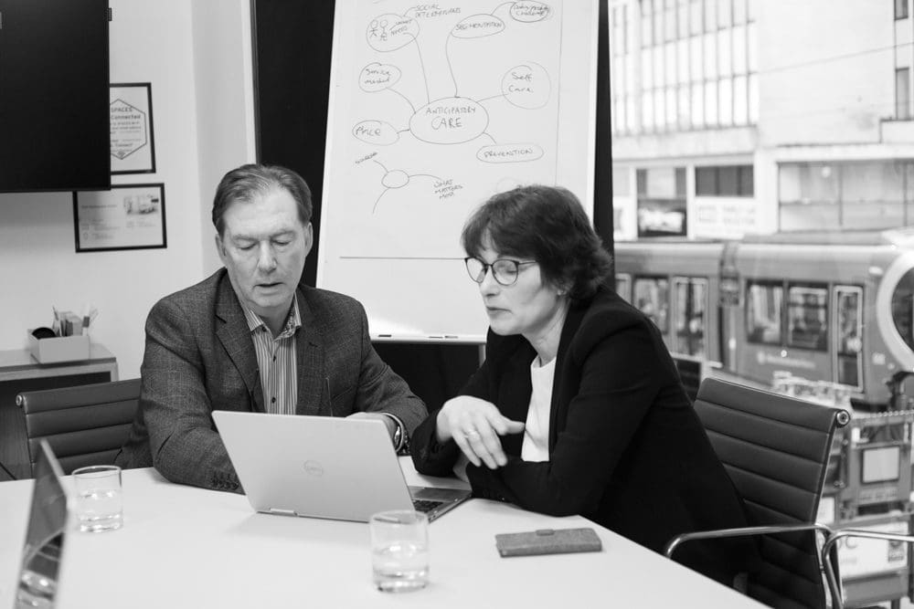 company photoshoot meeting b&w