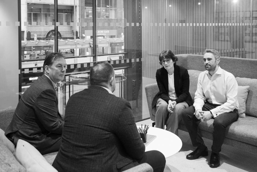 company photoshoot meeting b&w