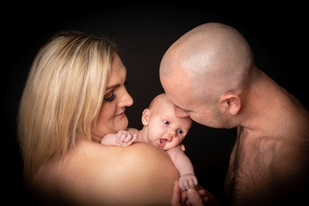 mom and dad skin to skin newborn shoot