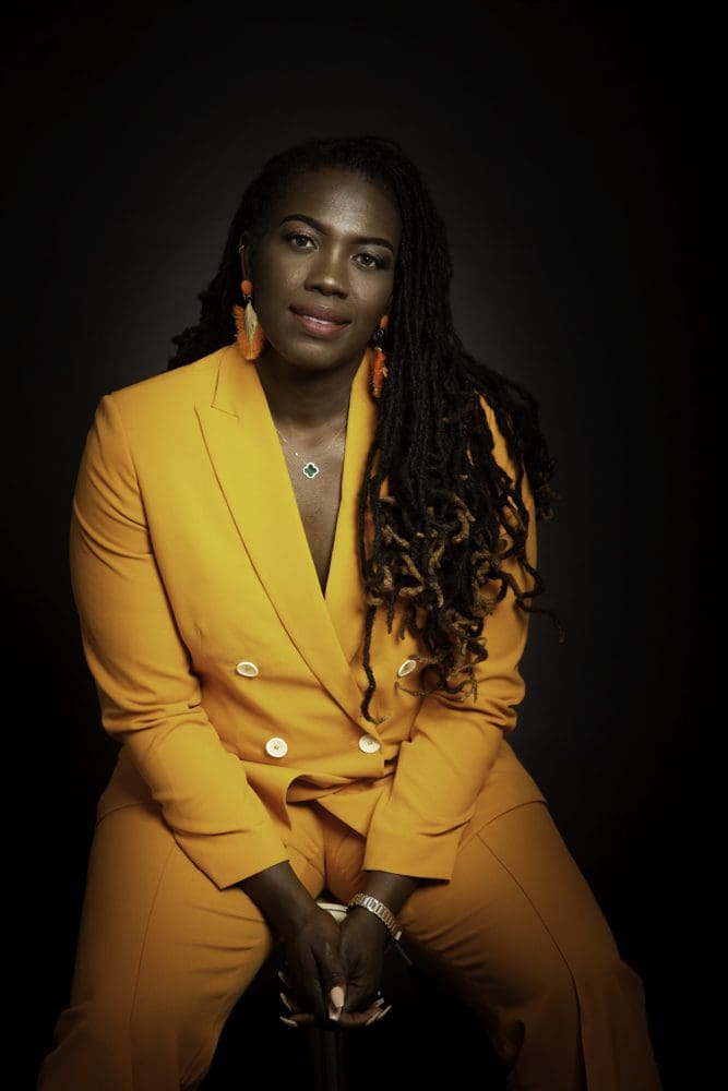 adult birthday studio portrait in Birmingham with confident seated pose
