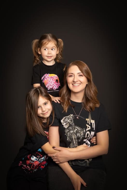 mother with two children smiling during Birmingham family photography session